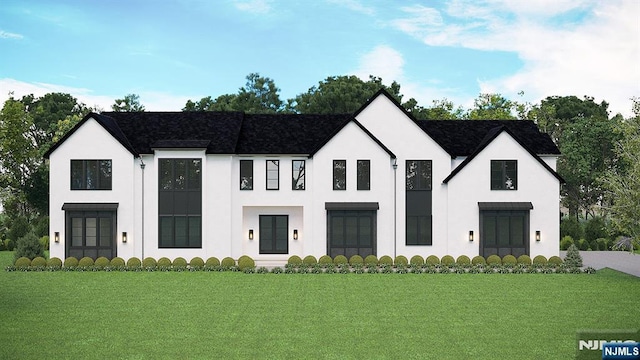 308 Garfield St, Haworth, NJ 07641 - view of front of house with stucco siding, a front yard, and french doors