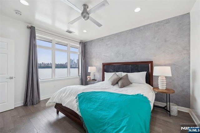 7400 River Rd Unit 431, North Bergen, NJ 07047 - bedroom with an accent wall, wood finished floors, baseboards, recessed lighting, and a ceiling fan