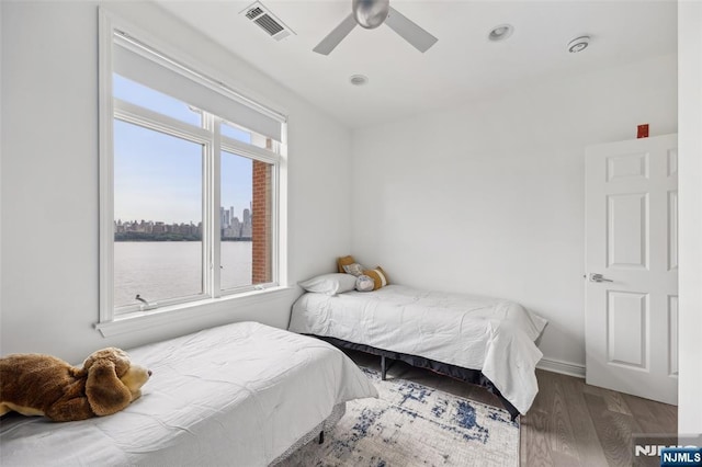 7400 River Rd Unit 431, North Bergen, NJ 07047 - bedroom with wood finished floors, recessed lighting, and ceiling fan