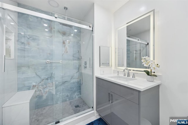 7400 River Rd Unit 431, North Bergen, NJ 07047 - full bathroom with vanity and a stall shower