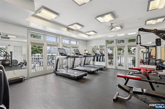 7400 River Rd Unit 431, North Bergen, NJ 07047 - gym featuring healthy amount of natural light, ceiling fan, and a tray ceiling