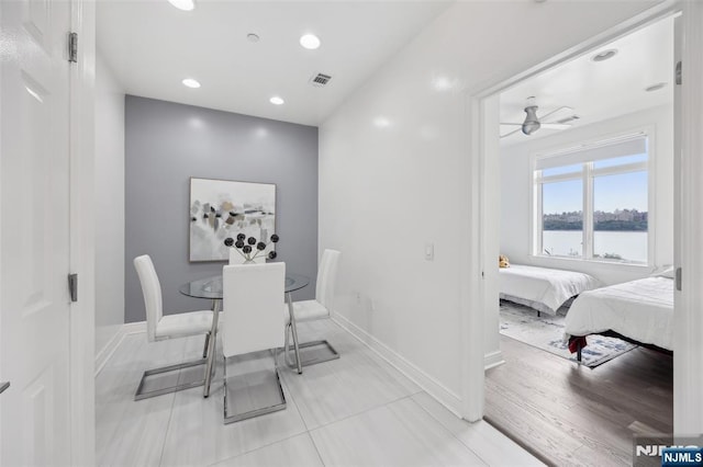 7400 River Rd Unit 431, North Bergen, NJ 07047 - dining space with baseboards, a water view, recessed lighting, and ceiling fan