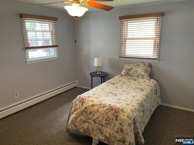 bedroom featuring baseboards, a baseboard radiator, and carpet