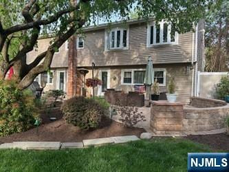 rear view of house with a patio area