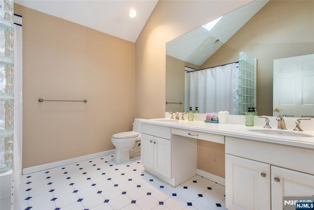 38 Farley Pl, Allendale, NJ 07401 - full bathroom with toilet, lofted ceiling with skylight, tile patterned floors, and a sink