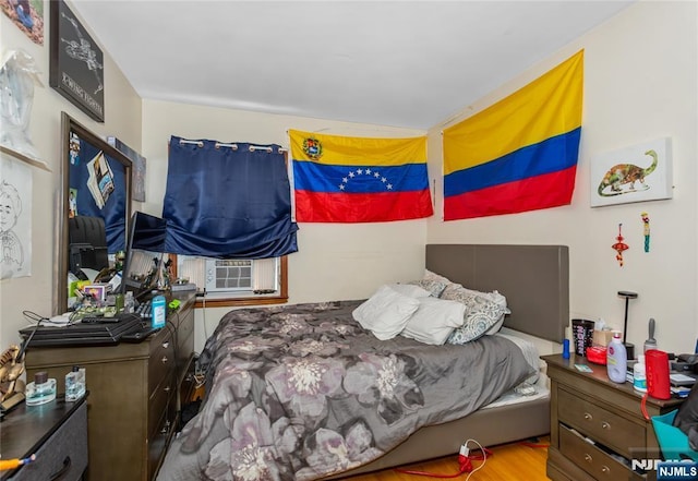bedroom with cooling unit