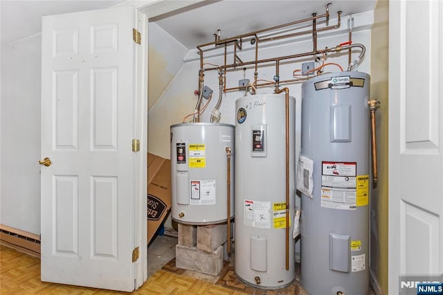 utilities featuring water heater and baseboard heating