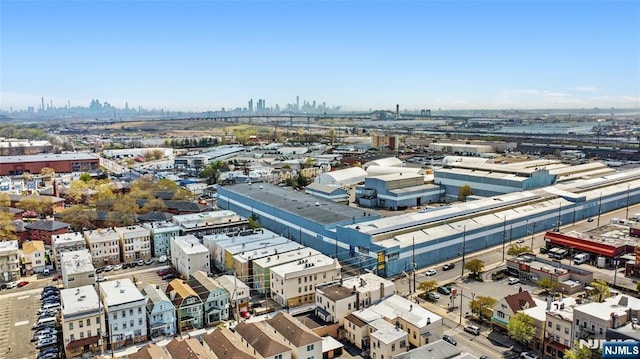 birds eye view of property with a view of city