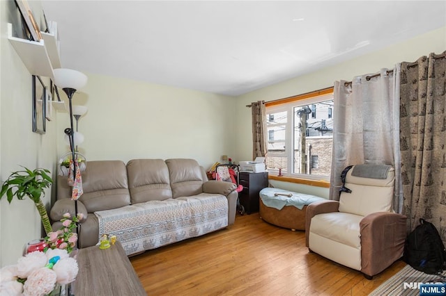 living room with wood finished floors