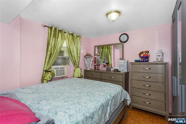 bedroom with cooling unit