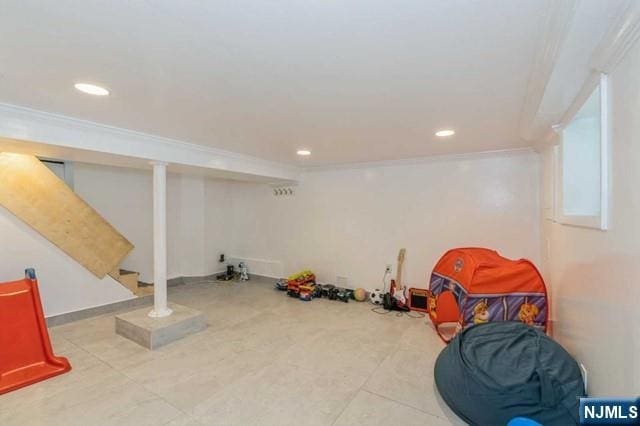 rec room featuring tile patterned floors, recessed lighting, and ornamental molding