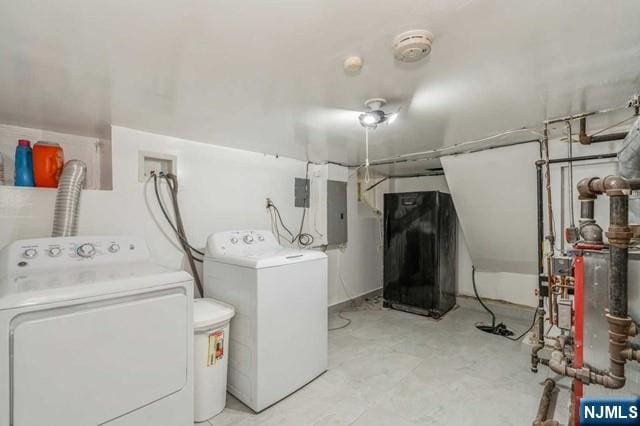 laundry room with washer and dryer