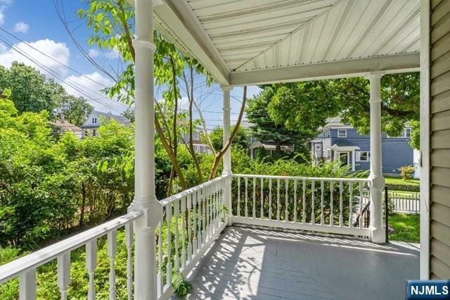 balcony featuring covered porch