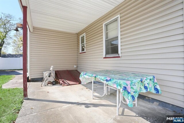 view of patio / terrace with fence