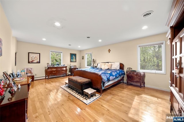 161 Winding Way, Old Tappan, NJ 07675 - bedroom featuring a baseboard radiator, light wood-style flooring, and recessed lighting