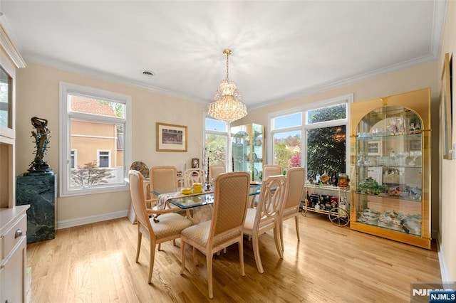 161 Winding Way, Old Tappan, NJ 07675 - dining space featuring a chandelier, ornamental molding, and light wood finished floors