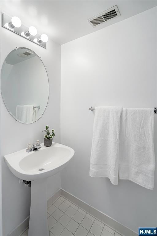 2304 Wendover Dr, Pequannock Township, NJ 07444 - bathroom featuring tile patterned floors, visible vents, and baseboards