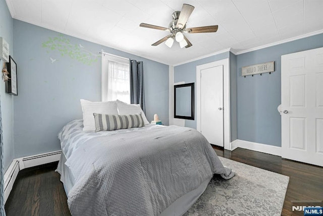 bedroom featuring dark wood-type flooring, baseboards, ceiling fan, and crown molding
