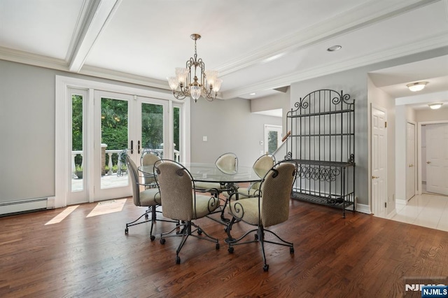 dining area with wood finished floors, a baseboard radiator, a notable chandelier, french doors, and crown molding