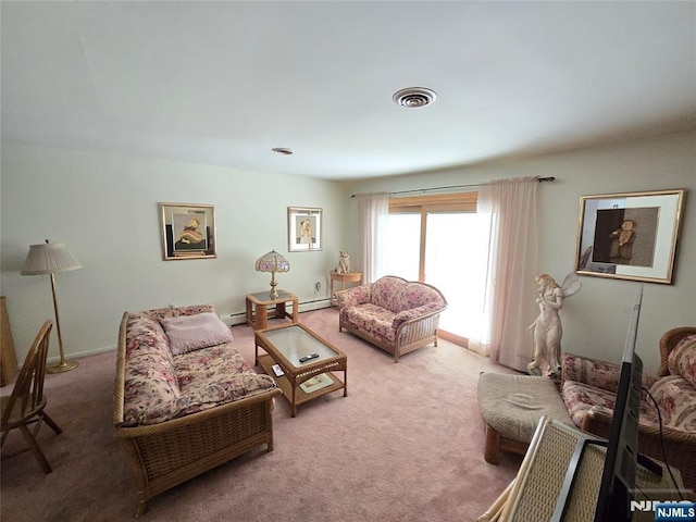 carpeted living area with visible vents, baseboard heating, and baseboards
