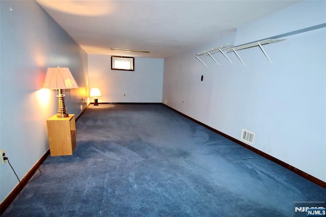 interior space with baseboards and visible vents