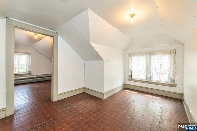 117 Saint Marys Pl, Nutley, NJ 07110 - bonus room featuring wood-type flooring, a baseboard heating unit, baseboards, and vaulted ceiling