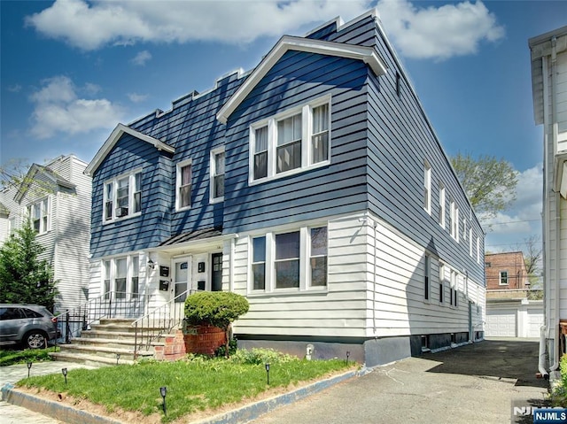 view of front facade with an outdoor structure