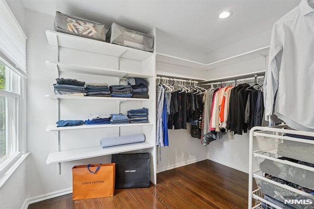 spacious closet with wood finished floors