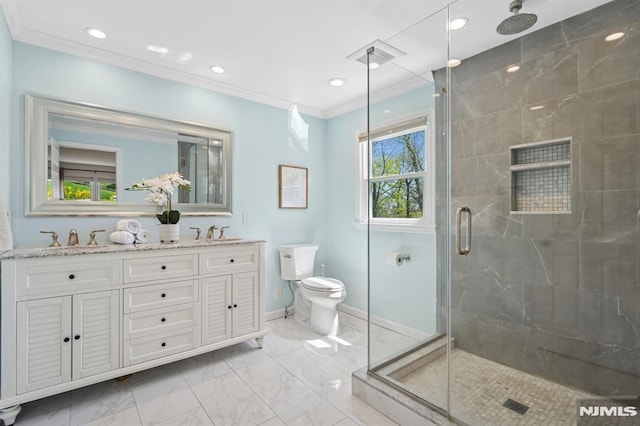 full bathroom featuring a stall shower, toilet, marble finish floor, and a sink
