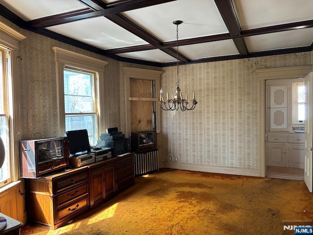 home office with beam ceiling, a chandelier, coffered ceiling, light carpet, and wallpapered walls