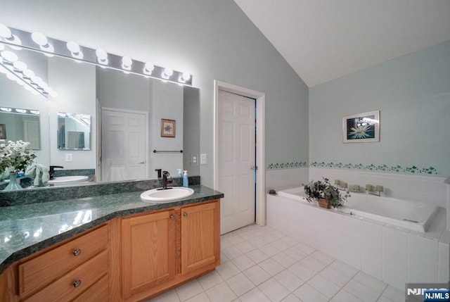 6 Knollwoods, Oakland, NJ 07436 - bathroom featuring a garden tub, tile patterned flooring, lofted ceiling, and vanity