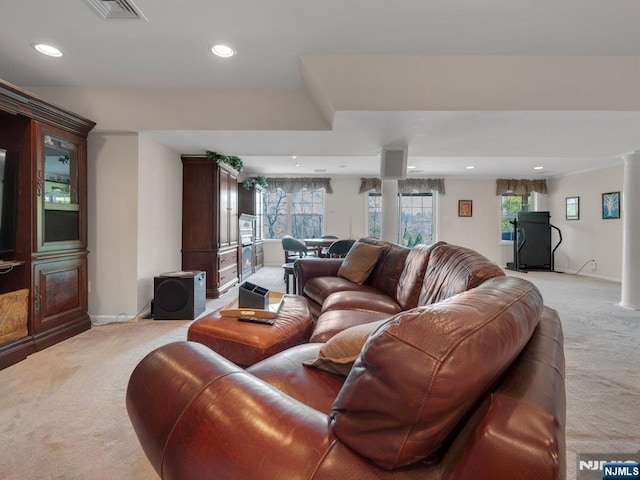 6 Knollwoods, Oakland, NJ 07436 - living room with visible vents, baseboards, recessed lighting, light carpet, and decorative columns