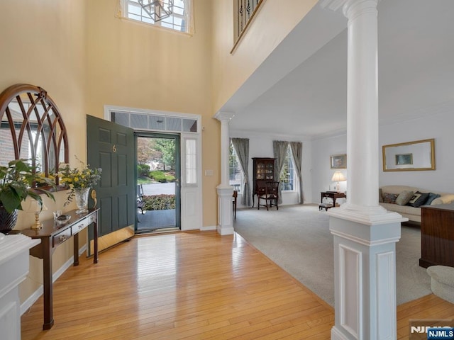 6 Knollwoods, Oakland, NJ 07436 - entryway with light wood finished floors, a healthy amount of sunlight, and ornate columns