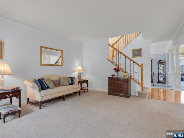 6 Knollwoods, Oakland, NJ 07436 - carpeted living room with baseboards, decorative columns, stairs, and crown molding