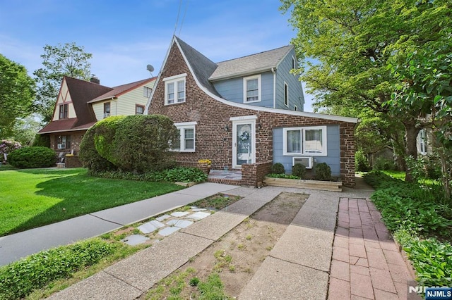 884 Helen St, Teaneck, NJ 07666 - view of front of property featuring a front yard and brick siding