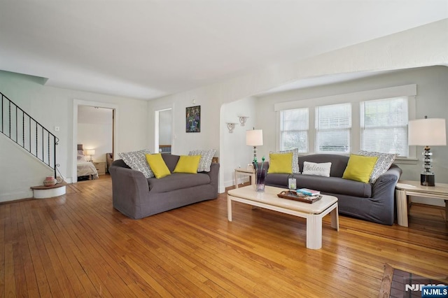 884 Helen St, Teaneck, NJ 07666 - living area with light wood-type flooring and stairway
