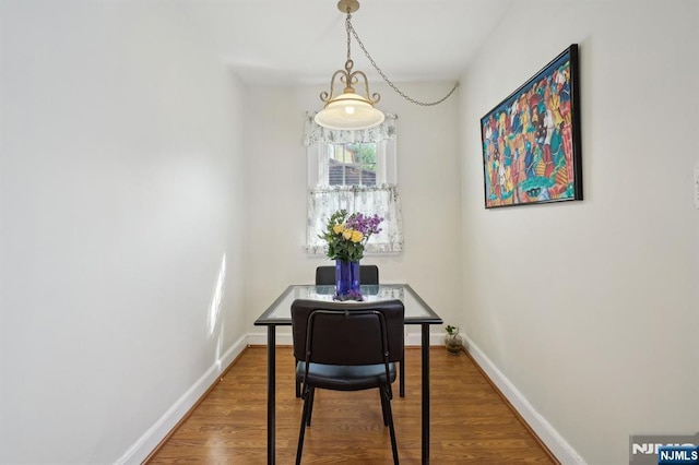 884 Helen St, Teaneck, NJ 07666 - dining space with wood finished floors and baseboards