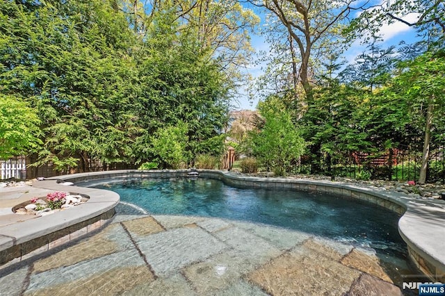322 Maple St, Ramsey, NJ 07446 - outdoor pool with a fenced backyard