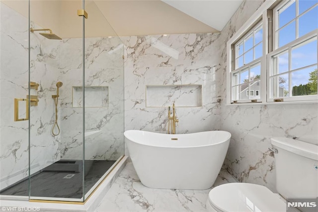 bathroom with a soaking tub, a marble finish shower, toilet, tile walls, and marble finish floor