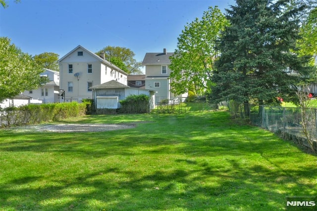 view of yard featuring fence