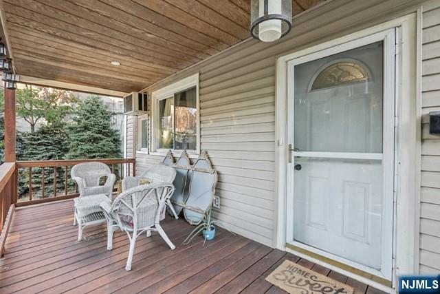 deck with covered porch