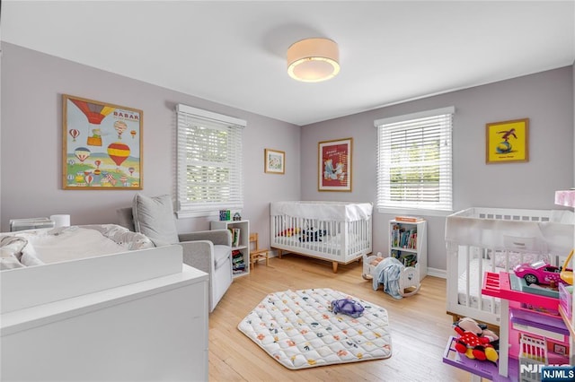 bedroom with wood finished floors
