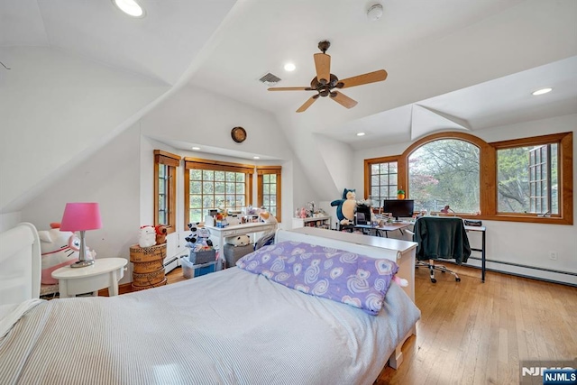 bedroom with multiple windows, vaulted ceiling, recessed lighting, and visible vents