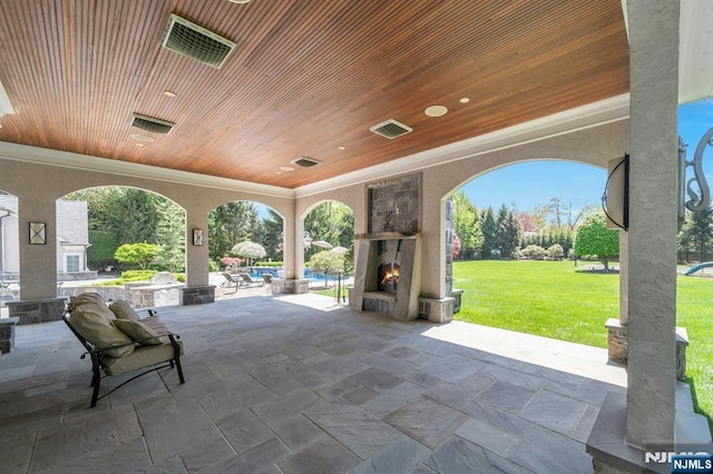 21 Birchwood, Old Tappan, NJ 07675 - view of patio featuring an outdoor stone fireplace