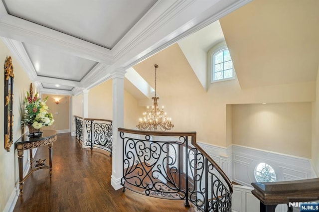 21 Birchwood, Old Tappan, NJ 07675 - corridor with an upstairs landing, a chandelier, wood finished floors, decorative columns, and wainscoting
