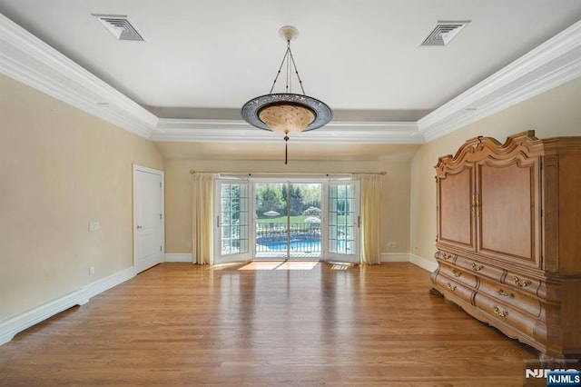 21 Birchwood, Old Tappan, NJ 07675 - spare room with ornamental molding, light wood-style floors, baseboards, and a raised ceiling
