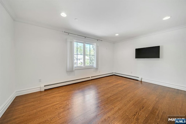 21 Birchwood, Old Tappan, NJ 07675 - spare room featuring crown molding, wood finished floors, a baseboard heating unit, recessed lighting, and baseboards