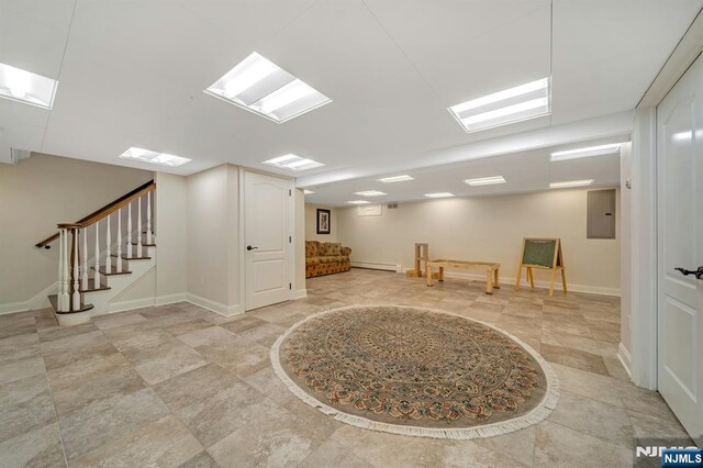21 Birchwood, Old Tappan, NJ 07675 - foyer entrance with electric panel, baseboard heating, baseboards, and stairs