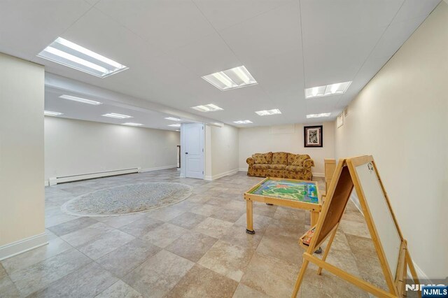 21 Birchwood, Old Tappan, NJ 07675 - game room featuring a baseboard radiator and baseboards