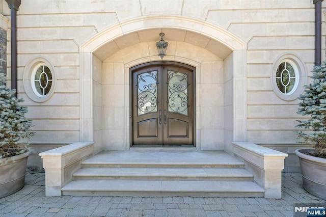 21 Birchwood, Old Tappan, NJ 07675 - property entrance with stone siding and french doors